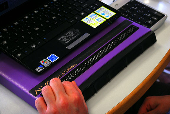 closeup of Braille display, showing refreshable pins